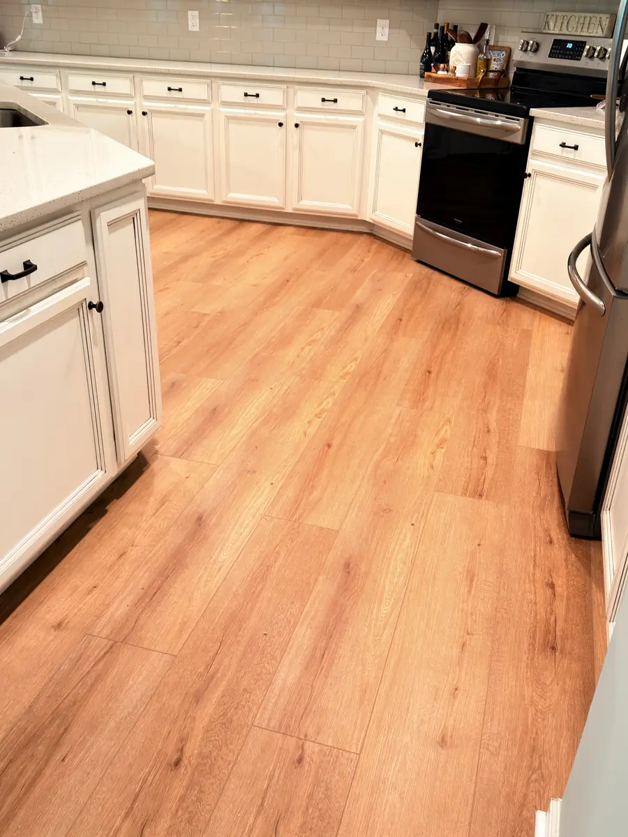 Luxury vinyl plank floor installed in a Charlotte kitchen