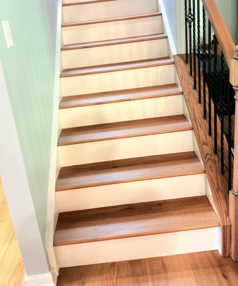 Staircase with LVP treads and white risers